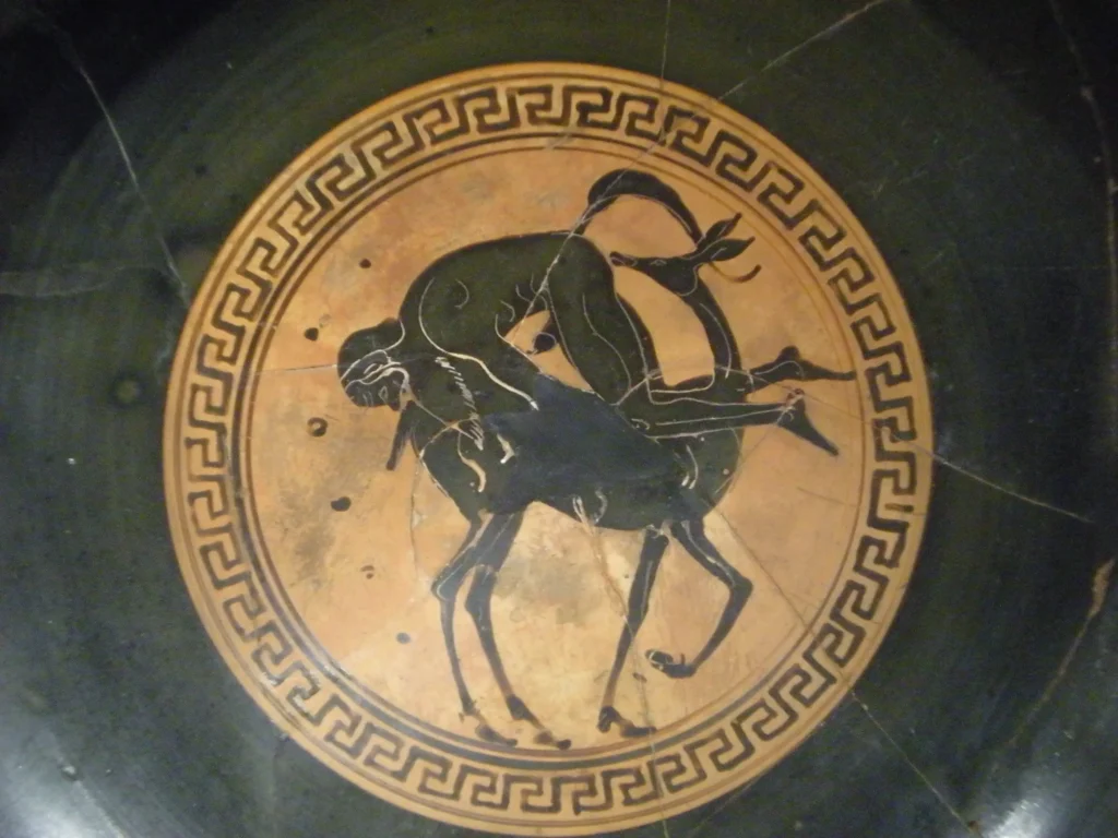 A kylix depicting Silenus having sex with a fawn, dated after 500 BC.